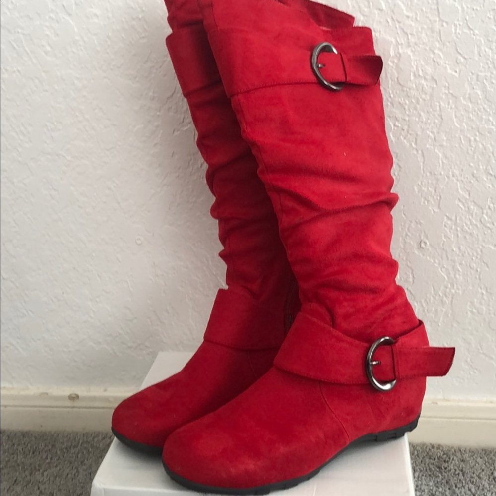 Women’s red knee high boots